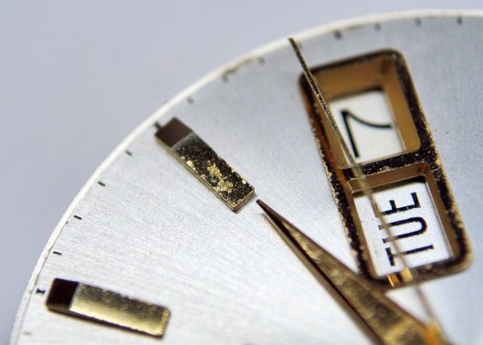 Tarnished hour markers