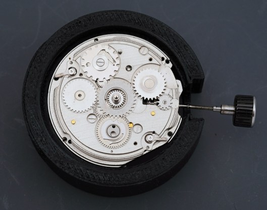 GMT functions beneath the dial guard