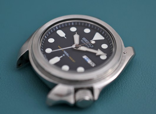 Movement refitted to the case, viewed from the front.  The bezel is not yet fitted