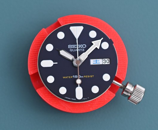 The dial with all three hands refitted