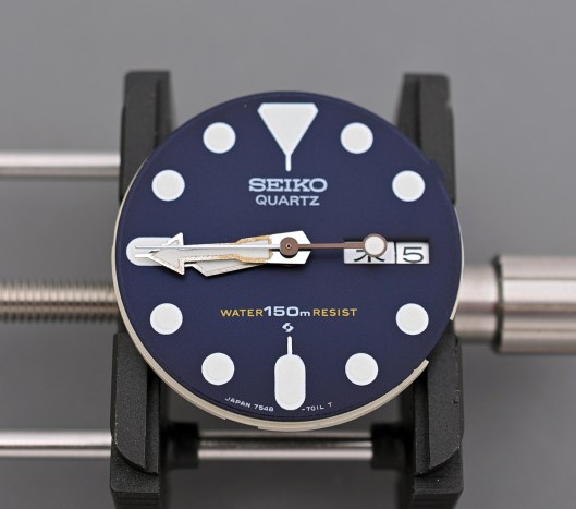 Seiko 7548 dial and hands with hands aligned to 8.45