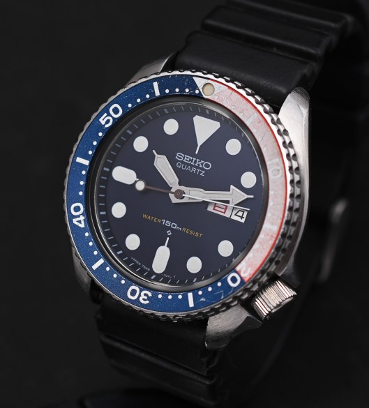 A slanted view of the finished watch, fitted to a strap